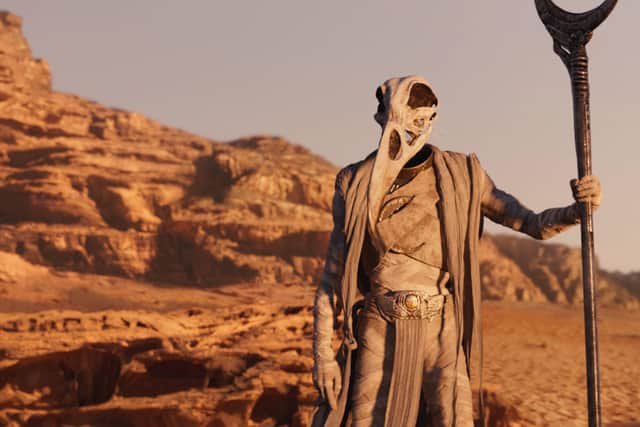 F. Murray Abraham and Karim Al-Hakim as Khonshu, stood in the desert, in Marvel’s Moon Knight (Credit: Marvel Studios)