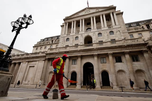 The Bank of England determines how much interest you’ll have to pay on top of what you borrow from lenders (image: AFP/Getty Images)
