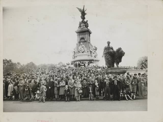 VE Day. The crowds assemble. This morning 's scenes of the Great Gathering at Buckingham Palace, General views of the crowds at the Palace, 8th May 1945.