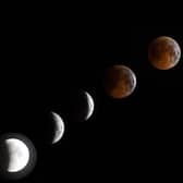 A combo of six pictures shows a ‘blood moon’ total lunar eclipse in Bishkek late on July 27, 2018 (Photo by VYACHESLAV OSELEDKO/AFP via Getty Images)