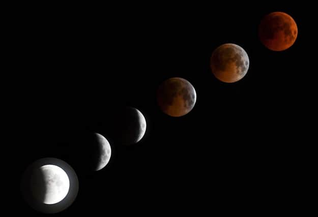 A combo of six pictures shows a ‘blood moon’ total lunar eclipse in Bishkek late on July 27, 2018 (Photo by VYACHESLAV OSELEDKO/AFP via Getty Images)