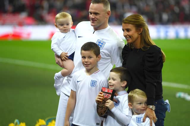 Wayne Rooney of England, his wife Coleen Rooney and their children Kit Joseph Ronney, Klay Anthony Rooney, Kai Wayne Rooney and Cass Mac Rooney (Photo by Mike Hewitt/Getty Images)