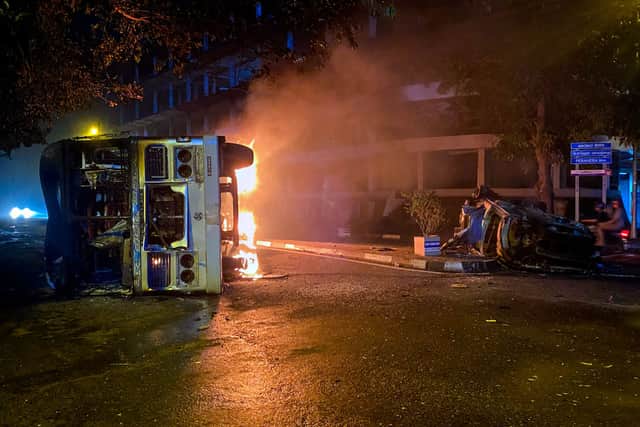 Buses used by Rajapaksa loyalists to travel to Colombo were torched or damaged by protestors (Photo: Getty Images)