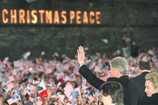 US President Bill Clinton waves to the crowd after his speech in the Guildhall Square in Derry (Pic: Getty Images)