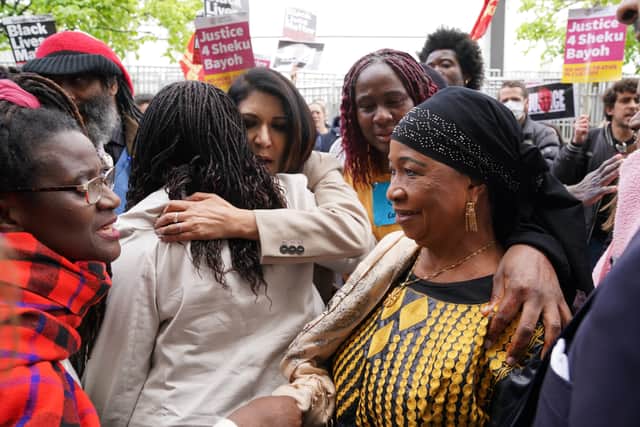 Sheku’s mother Aminata Bayoh (right) is greeted by supporters outside Capital House in Edinburgh at the start of a public inquiry into the death of Sheku Bayoh..