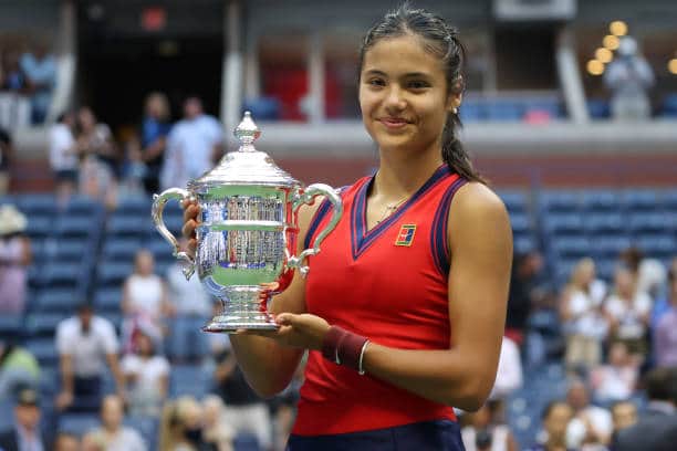 Emma Raducanu celebrates with the US Open trophy after victory at Flushing Meadows. Picture: Al Bello/Getty Images.