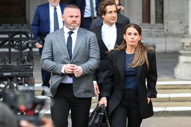 Wayne Rooney and Coleen Rooney depart the Royal Courts of Justice, Strand on May 10, 2022 in London, England (Photo by Eamonn M. McCormack/Getty Images)