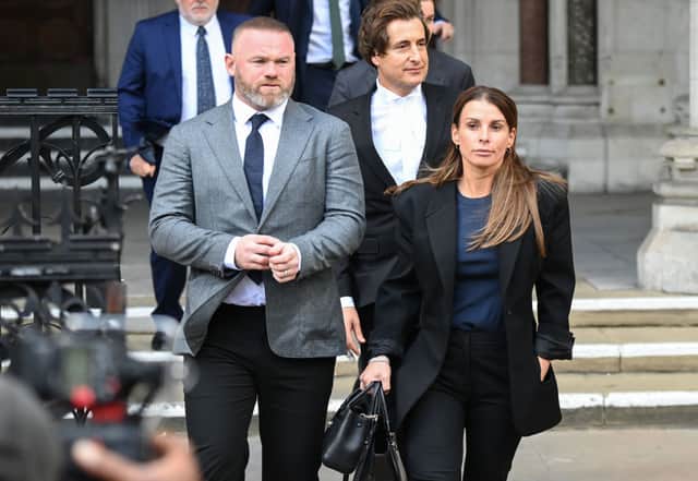 Wayne Rooney and Coleen Rooney depart the Royal Courts of Justice, Strand on May 10, 2022 in London, England (Photo by Eamonn M. McCormack/Getty Images)