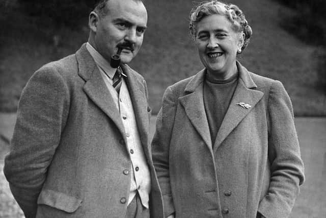 Writer Dame Agatha Christie, and her husband Max E. L. Mallowan, pose in March 1946 in the ground of their home, Greenway House, in Devonshire (Photo: AFP via Getty Images)