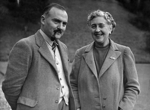Writer Dame Agatha Christie, and her husband Max E. L. Mallowan, pose in March 1946 in the ground of their home, Greenway House, in Devonshire (Photo: AFP via Getty Images)
