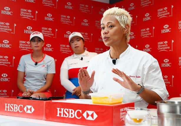 Chef Monica Galetti gives a masterclass to Paula Creamer of the Unites States (L), Shanshan Feng of China (C) and guests in the HSBC Hexagon Suite during the second round of the HSBC Women’s Champions at Sentosa Golf Club on March 4, 2016 in Singapore (Photo by Scott Halleran/Getty Images)
