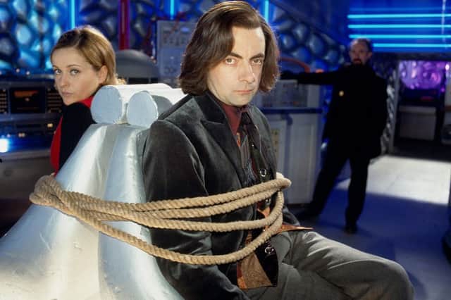Rowan Atkinson as Doctor Who, tied to the only chair on Skaro (Credit: BBC)