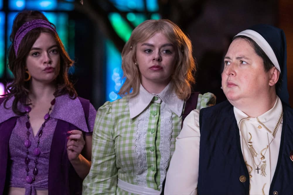 Dearbháile McKinney, Shauna Higgins, and Siobhán McSweeney in Derry Girls (Credit: Peter Marley)