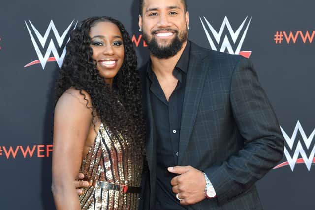 Naomi and her husband - fellow wrestler Jimmy Uso - in 2018 (Photo: VALERIE MACON/AFP via Getty Images)