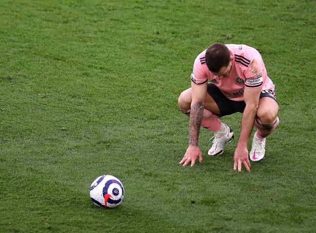 Billy Sharp of Sheffield United looks dejected following a Premier League loss to Leicester City in March 2021 (Photo: Alex Pantling/Getty Images)