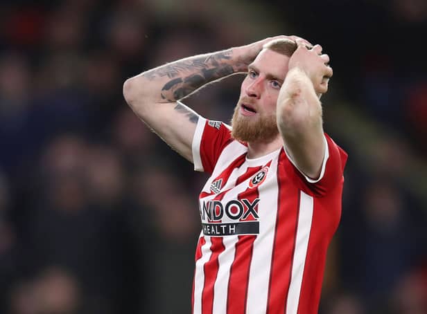 <p>Oli McBurnie  reacts after a missed chance during a match between Sheffield United and Hull City in February 2022 (Photo: George Wood/Getty Images)</p>