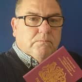 David Chadwick with his passport Credit: David Chadwick / SWNS