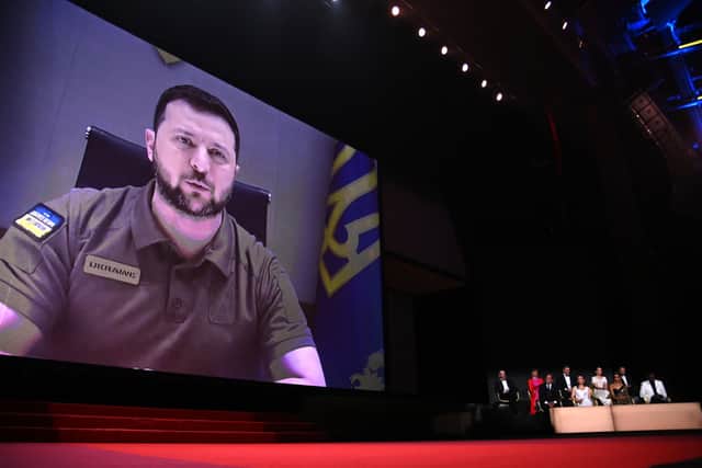 President of Ukraine Volodymyr Zelenskyy speaks in a live link-up video during the opening ceremony for the 75th annual Cannes film festival (Photo: Pascal Le Segretain/Getty Images)