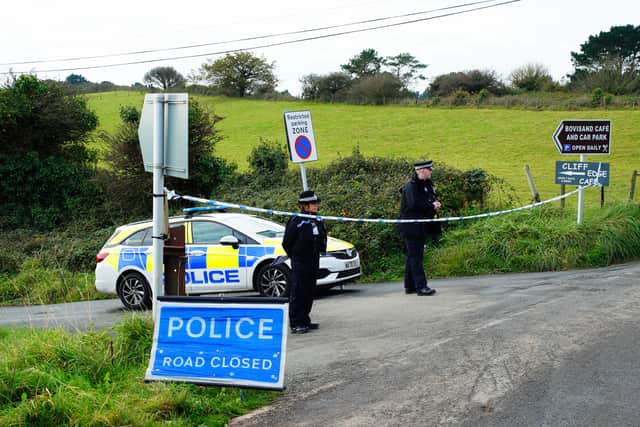 Police cordon on the road leading to the Bovisand cafe and car park in Plymouth,