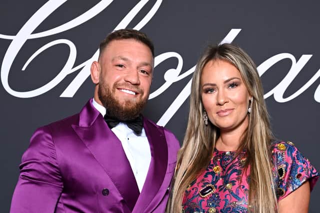 Conor McGregor and Dee Devlin attend the Chopard "Gentleman's Evening" during the 75th annual Cannes film festival at Rooftop Hotel Martinez on May 18, 2022 in Cannes, France.