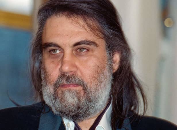 <p>Greek musician and composer Vangelis in 1992 (Photo: GEORGES BENDRIHEM/AFP via Getty Images)</p>