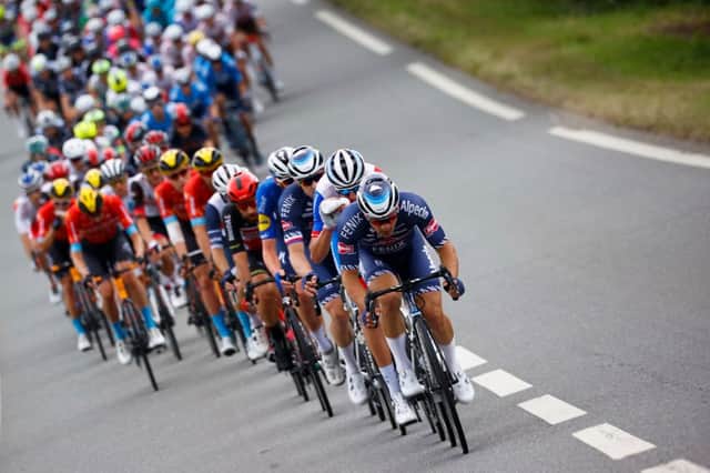The pack rides during the four stage of the 2021 Tour de France (Photo: THOMAS SAMSON/AFP via Getty Images)