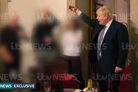 In pictures obtained by ITV News, Boris Johnson can be seen toasting a drink at an illegal gathering, for which he was not fined by the Met Police. (Credit: ITV)