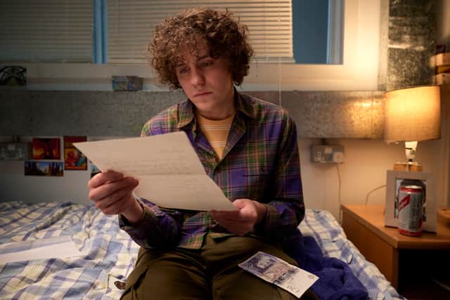 Dylan Llewellyn as Jack in Big Boys, reading a letter from his father (Credit: Channel 4)