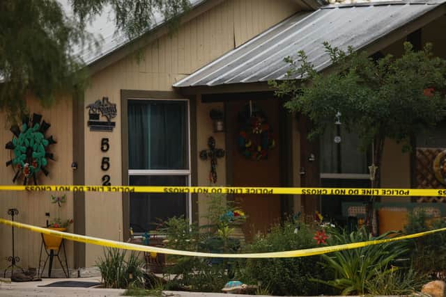 The home of 18-year-old Salvador Ramos cordoned off with police tape  (Photo by Jordan Vonderhaar/Getty Images)