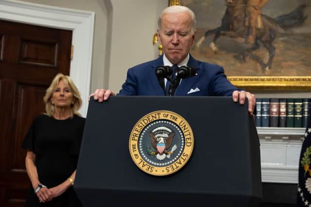U.S. President Joe Biden delivers remarks from the Roosevelt Room of the White House as first lady Jill Biden looks on concerning the mass shooting at a Texas elementary school (Photo by Anna Moneymaker/Getty Images)