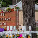 A memorial for victims outside Robb Elementary School, Uvalde, Texas (Pic:  Brandon Bell/Getty Images)