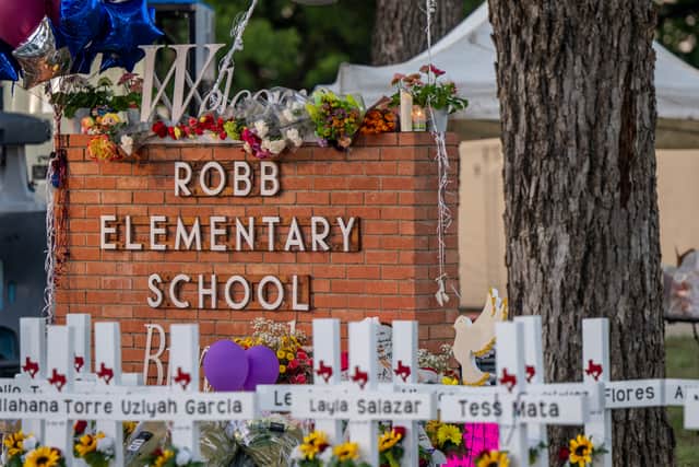 A memorial for victims outside Robb Elementary School, Uvalde, Texas (Pic:  Brandon Bell/Getty Images)