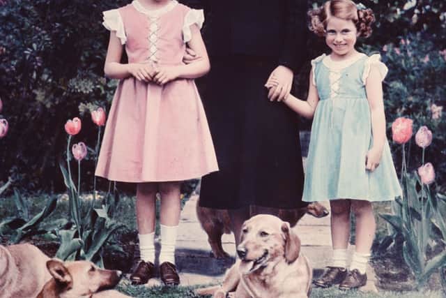 Queen Elizabeth became a homeowner at just six years old. She is pictured in 1936 on the left with her mother, the late Queen Mother, and her sister Princess Margaret.