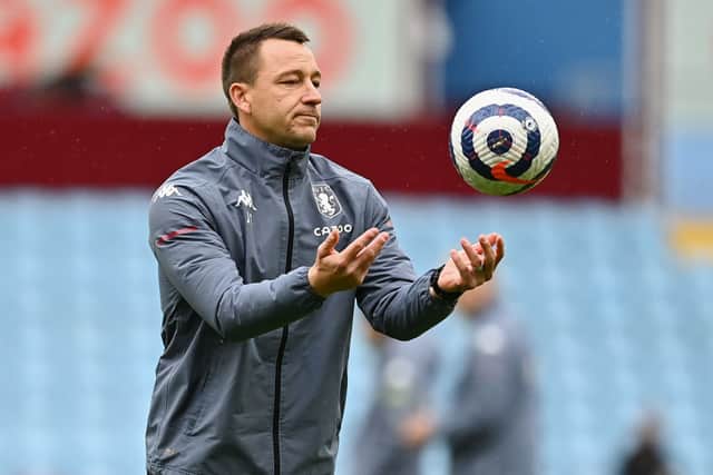 John Terry, Assistant Head Coach of Aston Villa warms his side up prior to the Premier League match between Aston Villa and Chelsea at Villa Park on May 23, 2021 in Birmingham, England (Photo by Clive Mason/Getty Images)