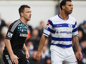 John Terry of Chelsea prepares to defend a corner with Anton Ferdinand of Queens Park Rangers during the FA Cup with Budweiser Fourth Round match between Queens Park Rangers and Chelsea at Loftus Road on January 28, 2012 in London, England (Photo by Clive Mason/Getty Images)