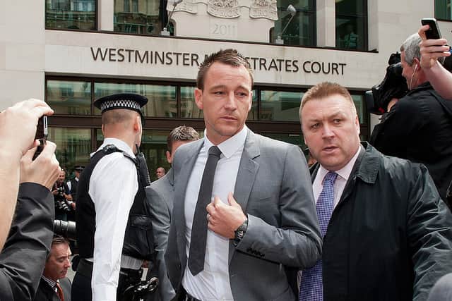 Chelsea and England footballer John Terry leaves Westminster Magistrates court in London, on July 13, 2012 (Photo: WILL OLIVER/AFP/GettyImages)