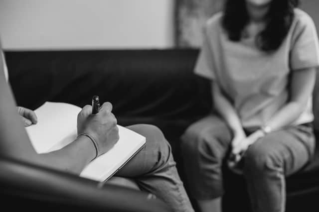 <p>New CPS guidance on therapy notes reduces protections for rape victims, campaigners argue (Image: Adobe)</p>