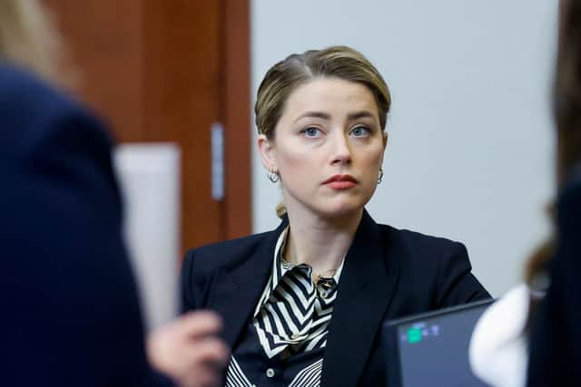 Actor Amber Heard arrives for her ex-husband Johnny Depp’s defamation trial against her (Photo by JONATHAN ERNST/POOL/AFP via Getty Images)