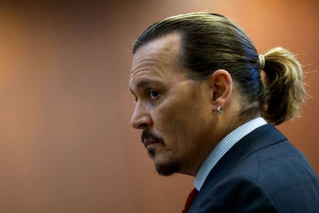 Actor Johnny Depp attends his defamation trial against his ex-wife Amber Heard (Photo by JONATHAN ERNST/POOL/AFP via Getty Images)