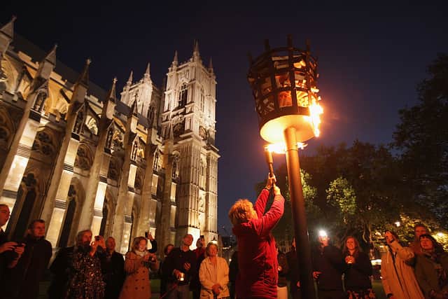 A beacon is lit outside Westminster Abbey as part of Diamond Jubilee celebrations in 2012 (Photo: Sean Gallup/Getty Images)