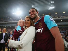 Andy Carroll, fiancee Billi Mucklow and son Arlo pose after the Barclays Premier League match between West Ham United and Manchester United (Photo by Paul Gilham/Getty Images)