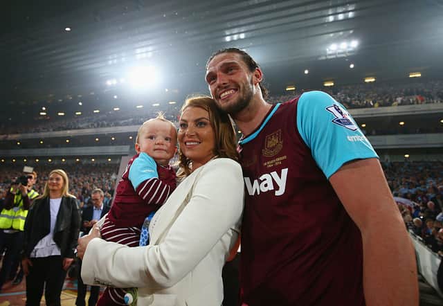 <p>Andy Carroll, fiancee Billi Mucklow and son Arlo pose after the Barclays Premier League match between West Ham United and Manchester United (Photo by Paul Gilham/Getty Images)</p>