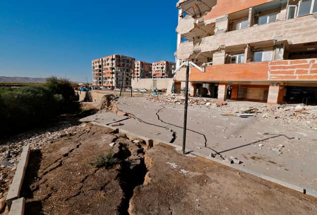 An earthquake causes damage to buildings and the ground after a 7.3 magnitude earthquake in Iran (Pic: AFP via Getty Images)
