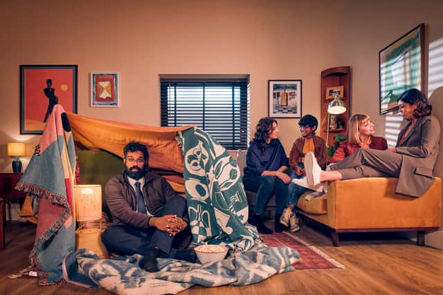 Romesh Ranganathan as Jonathan, hiding in a tent on the living room floor. On the sofa are Jessica Knappett as Claire, Kieran Logendra as Spencer, Lisa McGrillis as Courtney, and Mandeep Dhillon as Danielle (Credit: Rich Hardcastle/RangaBee Productions)