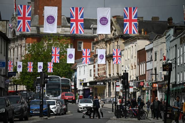 Union and Platinum Jubilee flags are pictured in a British high street for the Queen’s Platinum Jubilee celebrations in June 2022. This is where you can buy your own. 