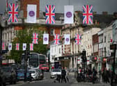 Union and Platinum Jubilee flags are pictured in a British high street for the Queen’s Platinum Jubilee celebrations in June 2022. This is where you can buy your own. 