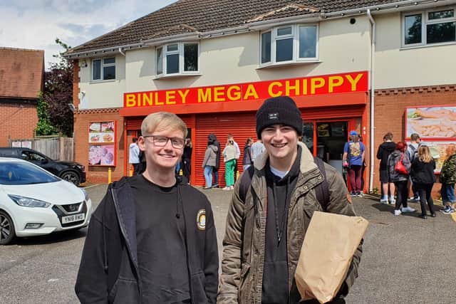 Happy customers Morgan, 19, and Ethan, 19, outside Binley Mega Chippy in Coventry 