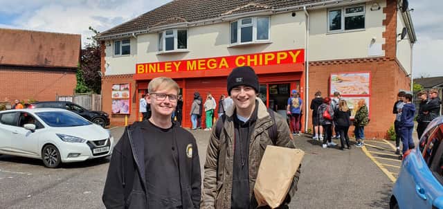 Happy customers Morgan, 19, and Ethan, 19, outside Binley Mega Chippy in Coventry 