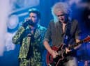 Adam Lambert performs with Brian May of Queen (Getty Images)