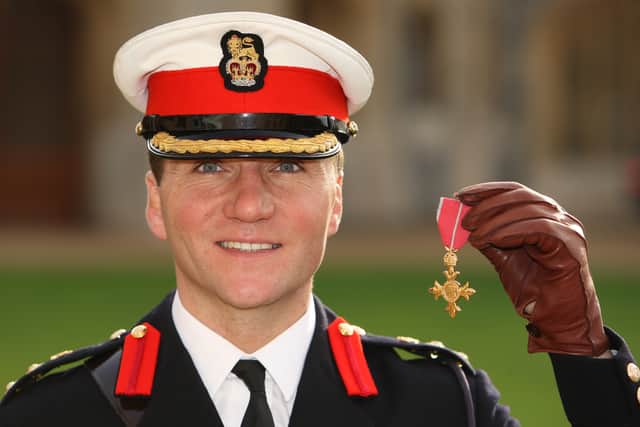  Colonel Charlie Stickland, Royal Marines, holds his OBE, which he received from The Queen at an investiture ceremony , at Windsor Castle December 1, 2009 in Windsor, England